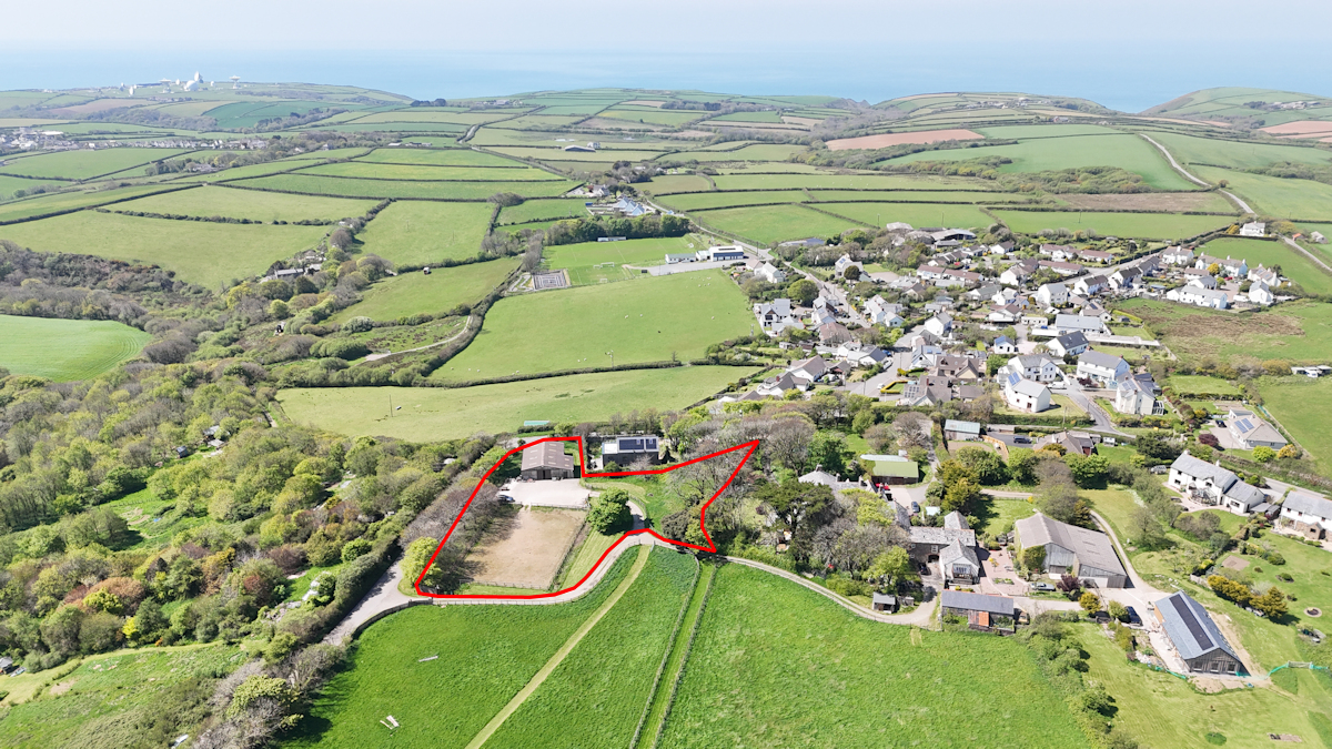 Aerial view of site looking west