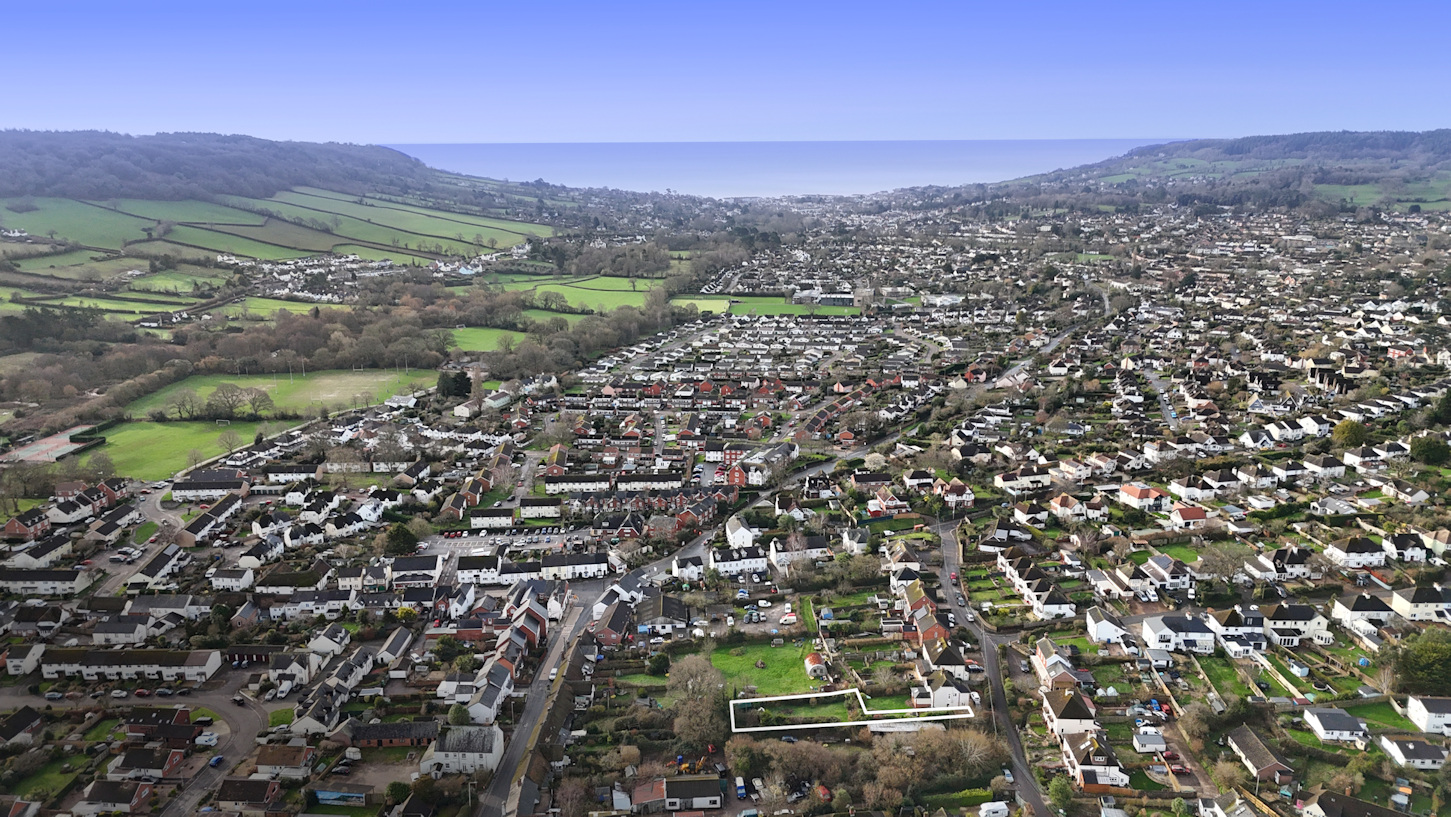 Aerial view with plot outlined in the foreground